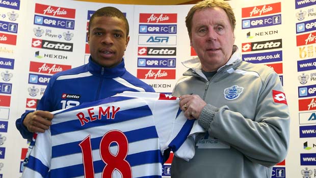 QPR boss Harry Redknapp welcomes Loic Remy to the club in January 2013.